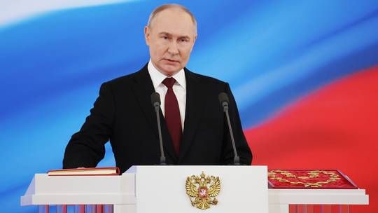 Путин