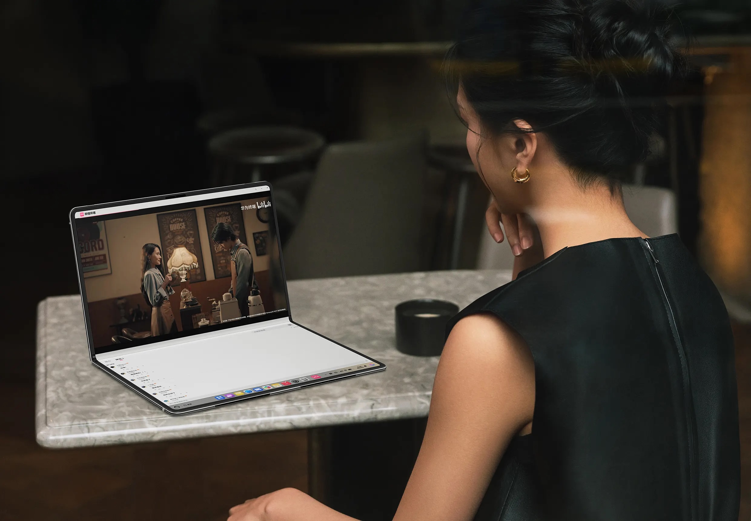 huawei-matebook-fold-ultimate-design-fold-screen-watching-videos-1